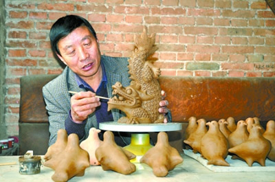 浚縣西楊玘屯村:泥咕咕吹響“兒時的呼喚”