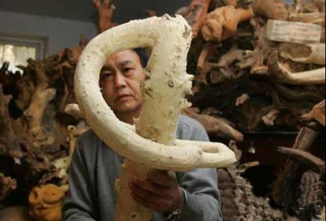 王心愿和他的根雕藝術